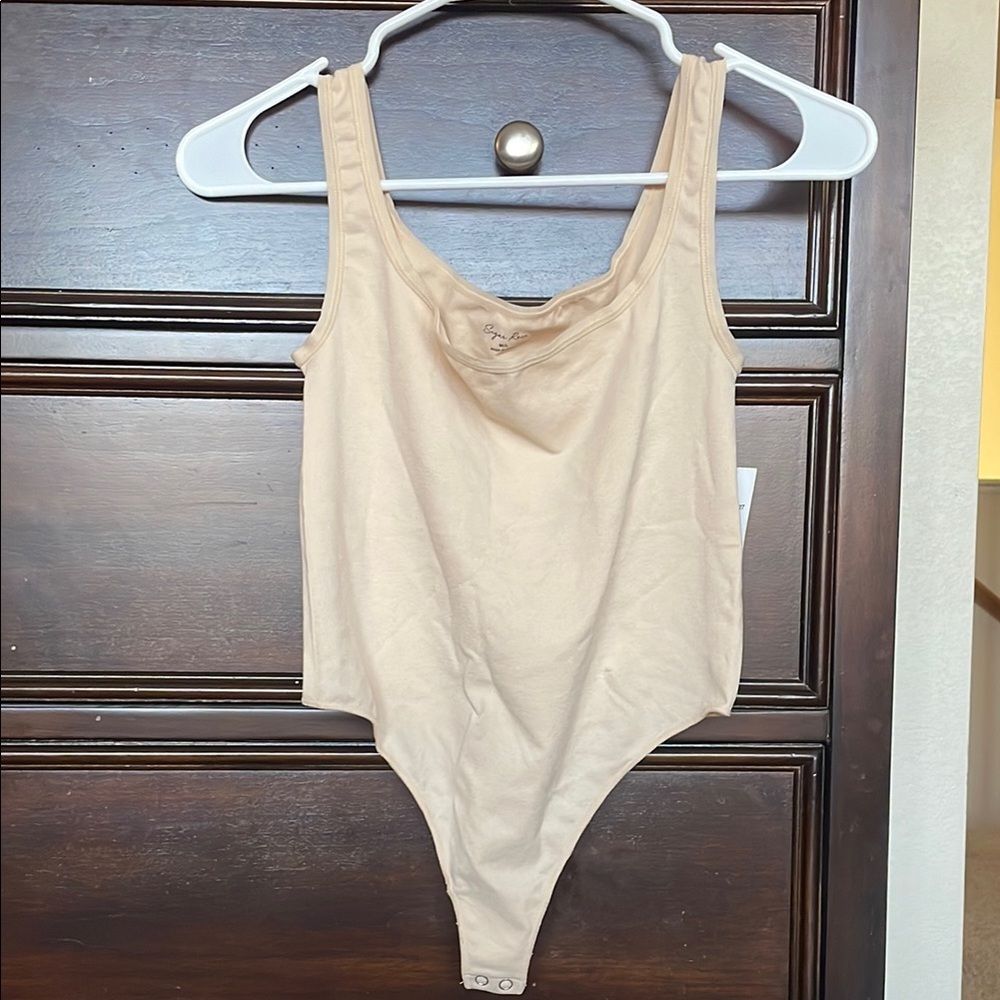 NWT nude bodysuit.